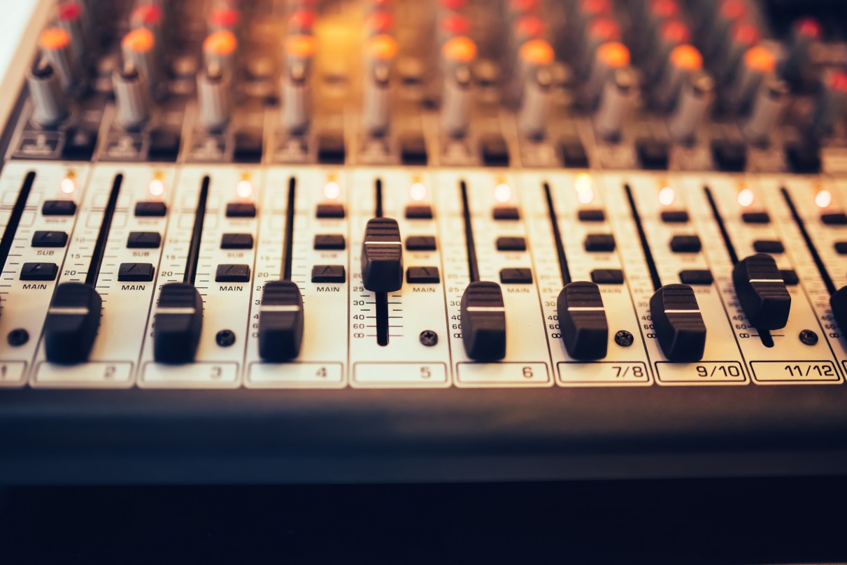 gallery/detail-of-a-music-mixer-in-studio-dj-working-for-pzkaxrw